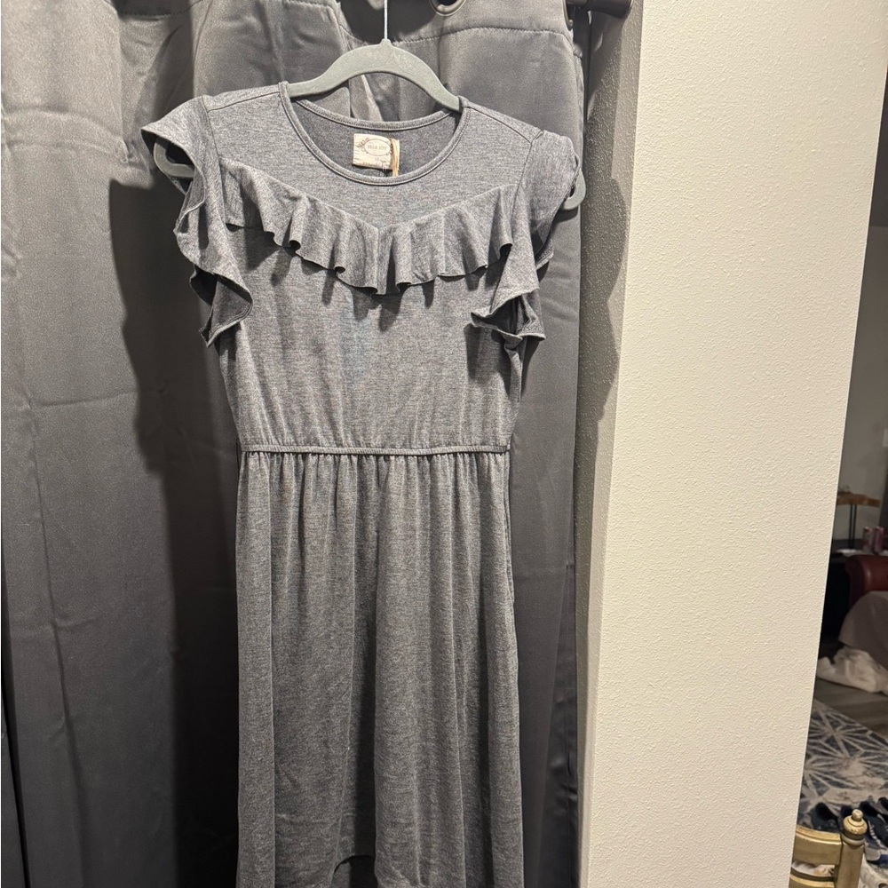 Joyfulie…a Mia Joy dress. My daughter outgrew it before she wore it. Tags on